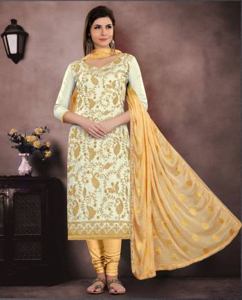 Flaunt Your Rich And Elegant Taste Wearing This Designer Straight Cut Suit In Cream Color Paired With Beige Colored Bottom And Dupatta. Its Top is Cotton Based Paired With Cotton Bottom And Chiffon Dupatta. Buy This Dress Material Now.