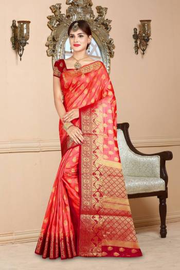 Adorn the Pretty Angelic And Royal Look Wearing This Saree In Red color Paired With Maroon Colored Blouse. This Saree And Blouse Are Art Silk Based Beautified With Weave All Over. Buy Now.