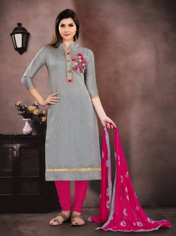 Flaunt Your Rich And Elegant Taste Wearing This Designer Straight Suit In Grey Colored Top Paired With Dark Pink Colored Bottom And Dupatta. Its Top IS Fabricated On Chanderi Paired With Santoon Bottom And Chiffon Dupatta. It Is Beautified With Attractive Hand Work. 