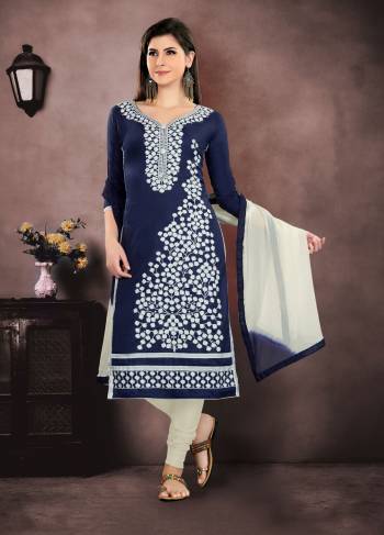 Enhance Your Personality Wearing This Designer Straight Suit In Navy Blue Colored Top Paired With White Colored Bottom And Dupatta. Its Top Is Cotton Based Paired With Cotton Bottom And Chiffon Dupatta. Buy Now.