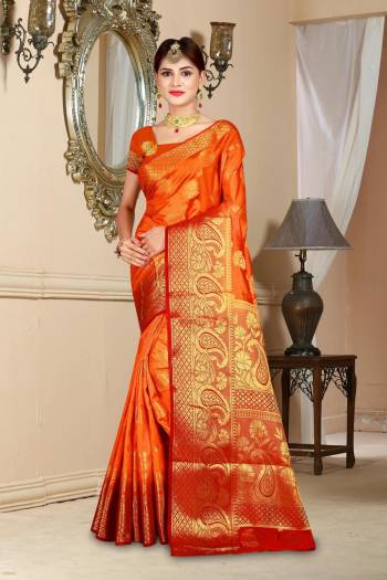 Celebrate This Festive Season Wearing This Saree In Orange Color Paired With Orange Colored Blouse. This Saree And Blouse Are Fabricated On Art Silk Beautified With Weave All Over It. Its Bright Color And Fabric Will Give  Beautiful Festive Feels.