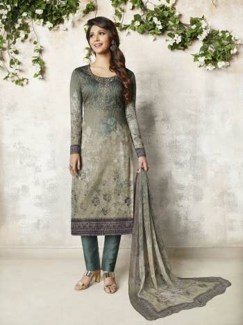 Enhance Your Personality Wearing this Designer Semi-Stitched Suit In Grey Color Paired With Dark Grey Bottom And Grey Colored Dupatta. Its Top Is Fabricated On Soft Cotton Paired With Cotton Bottom And Chiffon Dupatta. It Is Beautified With Prints And Resham Embroidery And Stone Work. 