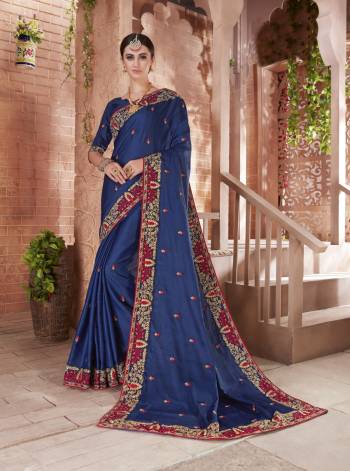 Enance Your Personality Wearing This Designer Saree In Blue Color Paired With Blue Colored Blouse. This Saree And Blouse are Art Silk Based Beautified With Jari And Thread Embroidery With Stone Work. Buy Now.