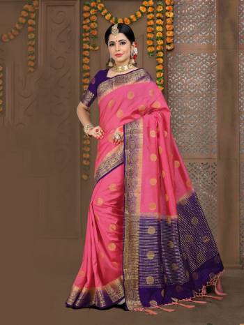 Look Pretty In This Pink Colored Rich Saree Paired With Contrasting Purple Colored Blouse. This Saree And Blouse Are Fabricated On Linen Beautified With Weave All Over. 