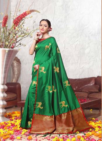 For A Proper Traditional Look, Grab This Beautiful Saree In Green Color Paired With Contrasting Maroon Colored Blouse, this Saree And Blouse Are Fabricated On Banarasi Art Silk Which Gives A Rich look To Your Personality. 