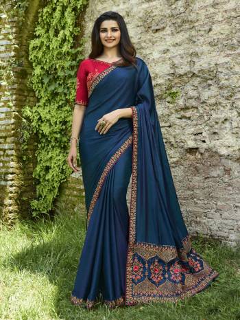 Enhance Your Personality Wearing This Designer Saree In Blue Color Paired With Contrasting Dark Pink Colored Blouse. This Saree Is Fabricated On Soft Silk Paired With Art Silk Fabricated Blouse. It Has Attractive Embroidery Over The Pallu And Blouse With Embroidered Lace Border.