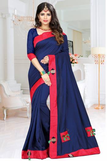 Enhance Your Personality Wearing This Designer Saree In Navy Blue Color Paired With Navy Blue Colored Blouse. This Saree And Blouse are Silk Based Beautified With Patch, Fancy Buttons And Tassels. Buy This Rich And Elegant Looking Saree Now.