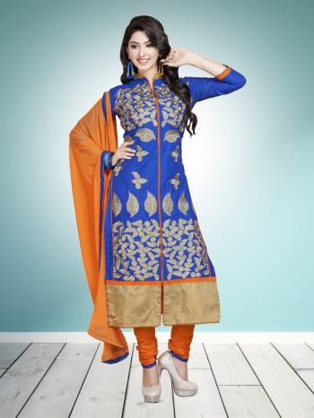 Shine Bright Wearing This Straight Suit In Royal Blue Colored Top Paired With Contrasting Orange Colored Bottom And Dupatta. Its Top And Bottom Are Cotton Based Paired With Chiffon Dupatta. Buy Now.