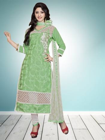 Subtle Shade Is Here With This Light Green Colored Straight Suit Paired With White Colored Botom And Dupatta. Its top And Bottom Are Cotton Based Paired With Chiffon Dupatta. Buy This Now.