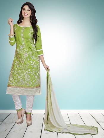 Subtle Shade Is Here With This Green Colored Straight Suit Paired With White Colored Botom And Dupatta. Its top And Bottom Are Cotton Based Paired With Chiffon Dupatta. Buy This Now.