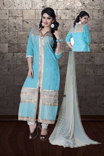 Simple Straight Suit For Your Semi-Casual Wear Is Here With This Blue Colored Suit Paired With White Colored Bottom And Dupatta. Its Top And Bottom Are Cotton Based Paired With Chiffon Dupatta. Buy Now.