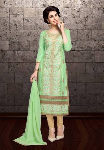 Add This Pretty Straight Suit For Semi-Casual Wear To Your Wardrobe In Light Green Color Paired With Beige Colored Bottom And Light Green Dupatta. Its Top And Bottom Are Cotton Based Paired With Chiffon Dupatta. Buy Now.