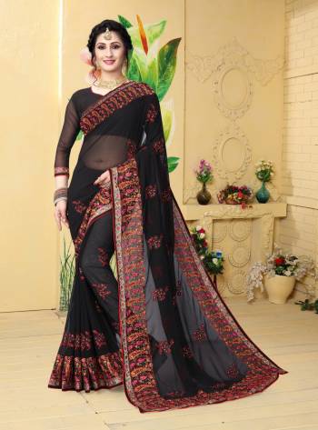 For A Traditional Bold And Beautiful Look, Grab This Designer Saree In Black Color Paired With Black Colored Blouse. This Saree And Blouse Are Fabricated On Georgette Beautified With Multi Colored Resham Embroidery. 