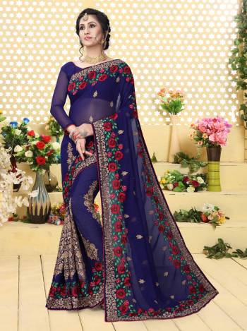 Grab This Beautiful And Attractive Dark Blue Colored Saree Paired With Dark Blue Colored Blouse. This Saree And Blouse Are Fabricated On Georgette Beautified With Multi Colored Resham And  Jari Work. Buy Now.