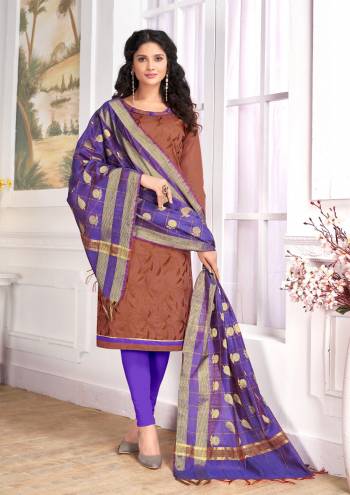 elegant Looking Straight Suit Is Here In Brown Colored Top Paired With Contrasting Purple Colored Bottom And Dupatta. Its Top And Bottom Are Cotton Based Paired With Banarasi Art Silk Dupatta. Buy This Suit Now.