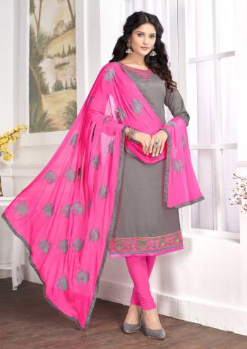 Flaunt Your Rich And Elegant In This Straight Suit In Grey Colored Top Paired With Contrasting Pink Colored Bottom And Dupatta. This Dress Material Is Cotton Based Paired With Chiffon Dupatta. 