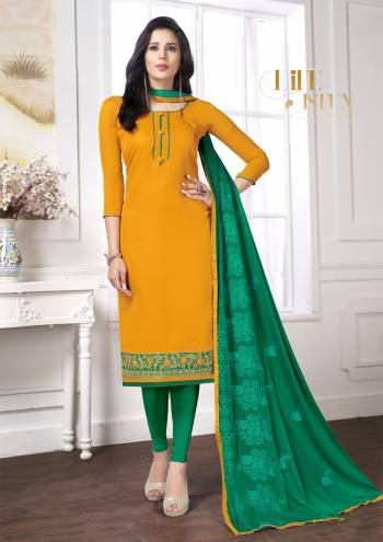 Celebrate This Festive Season With Ease And Comfort Wearing This Straight Suit In Musturd Yellow Colored Top Paired With Contrasting Green Colored Bottom And Dupatta. Its Top And Bottom Are Cotton Based Paired With Chiffon Dupatta. Its Fabric Ensures Supreb Comfort All Day Long.