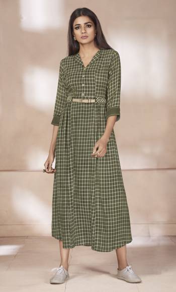 Green IS Your Color This Season, So Grab This Designer Readymade Long Kurti With Checks Prints In Olive Green Color Fabricated On Rayon. This Kurti Is Light Weight And Easy To Carry All Day Long.