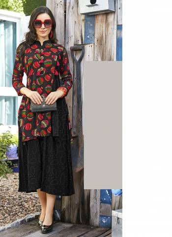 Simple Kurti IS Here For Your Casual Or Semi-Casual Wear In Black Color Which Is Rayon Based. It Is Beautified With Unique Prints. Buy Now.