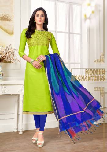 Here Is An Attractive Shade With This Dress Material In Parrot Green Color Paired With Contrasting Royal Blue Colored Bottom And Dupatta. Its top And Bottom Are Cotton Based Paired With Art Silk Dupatta. 