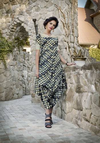 Multiple Shades In Grey Are Used In This Designer Readymade Kurti. It Is Fabricated On Satin Beautified With Prints All Over It. Buy Now.