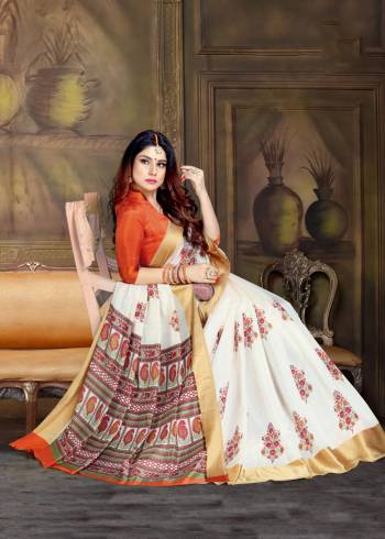 Simple Saree If Here For Your Semi-Casual Wear In White Color Paired Orange Colored Blouse. This Saree And Blouse Are Silk based Beautified With Prints All Over It. 