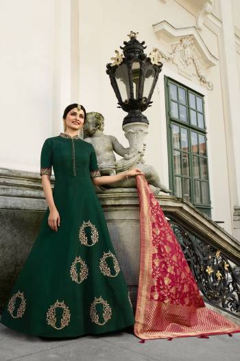 Enhance Your Personality Wearing This Designer Floor Length Readymade Gown In Pine Green Color Paired With Contrasting Dark Pink  Colored Dupatta. Its Top Is Fabricated On Art Silk and Jacquard Silk Paired With Banarasi Silk Fabricated Dupatta. 