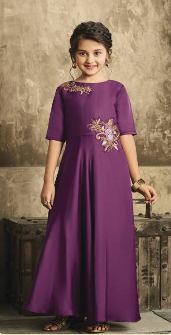 Shine Bright In This Beautifiul Designer Floor Length Gown In Purple Color Fabricated On Satin. This Pretty Gown Is Available For Both Age Group You And Your Daughter. Buy This Soon Before The Stock Ends.