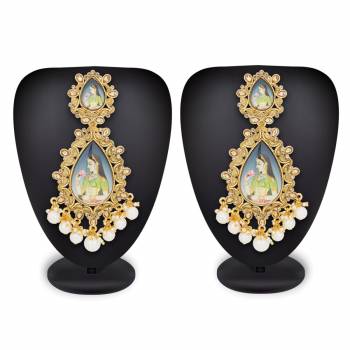 Add On More Beauty To Your Look With This Lovely Pair Of Earrings Which Can Be Paired with Same Or Any Contrasting Colored Traditional Attire. Buy This Lovely Pair Now.