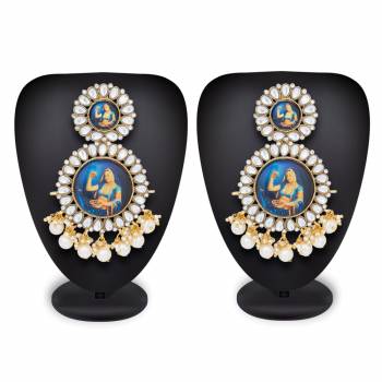 Add On More Beauty To Your Look With This Lovely Pair Of Earrings Which Can Be Paired with Same Or Any Contrasting Colored Traditional Attire. Buy This Lovely Pair Now.