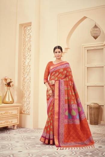 For Festive Feel, Grab This Silk Based Saree In Orange Color Paired With Orange Colored Blouse. This Saree And Blouse Are Beautified With Simple Printed Motifs. 