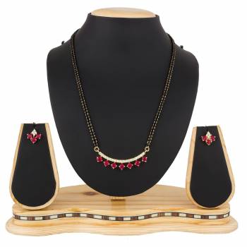 Give An Elegant Look To Your Neckline With This Rich Designer Mangalsutra Set Beautified With Diamond Work. Also It Comes With A Pair OF Earrings. Pair This Up With Any Colored Attire, Be It Casual Or Heavy. 