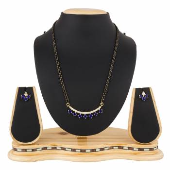 Give An Elegant Look To Your Neckline With This Rich Designer Mangalsutra Set Beautified With Diamond Work. Also It Comes With A Pair OF Earrings. Pair This Up With Any Colored Attire, Be It Casual Or Heavy. 