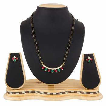 Give An Elegant Look To Your Neckline With This Rich Designer Mangalsutra Set Beautified With Diamond Work. Also It Comes With A Pair OF Earrings. Pair This Up With Any Colored Attire, Be It Casual Or Heavy. 