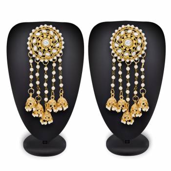 Beautiful Patterned Earrings Set Is Here With Multiple Jhumki Hangings. It Is In Golden Color So That It Can Be Paired With Any Colored Attire. 