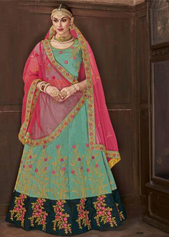 Get Ready For The Upcoming Festive And Wedding Season With This Heavy Designer Lehenga Choli In Sea Green Color Paired With Contrasting Dark Pink Colored Dupatta. This Lehenga Choli Is Fabricated On Art Silk Paired With Net Fabricated Dupatta. Buy Now.