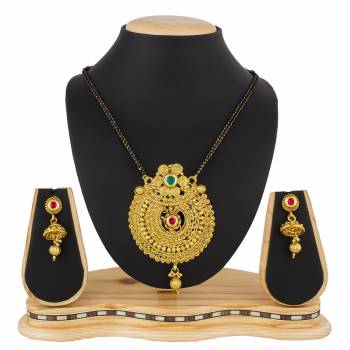 Here Is A Heavy Patterned Mangalsutra In Golden Color With Pretty Set Of Earrings. This Mangalsutra Is Suitable For Function OR Wedding Wear. It Can Be Paired With Any Colored Attire. 