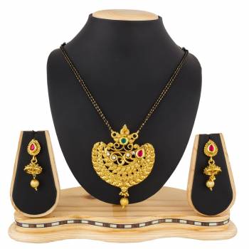 Here Is A Heavy Patterned Mangalsutra In Golden Color With Pretty Set Of Earrings. This Mangalsutra Is Suitable For Function OR Wedding Wear. It Can Be Paired With Any Colored Attire. 