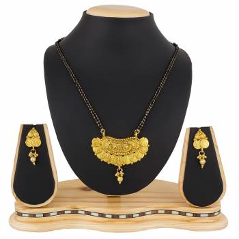 Here Is A Heavy Patterned Mangalsutra In Golden Color With Pretty Set Of Earrings. This Mangalsutra Is Suitable For Function OR Wedding Wear. It Can Be Paired With Any Colored Attire. 