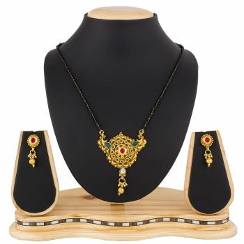 Here Is A Heavy Patterned Mangalsutra In Golden Color With Pretty Set Of Earrings. This Mangalsutra Is Suitable For Function OR Wedding Wear. It Can Be Paired With Any Colored Attire. 