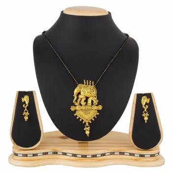 Here Is A Heavy Patterned Mangalsutra In Golden Color With Pretty Set Of Earrings. This Mangalsutra Is Suitable For Function OR Wedding Wear. It Can Be Paired With Any Colored Attire. 