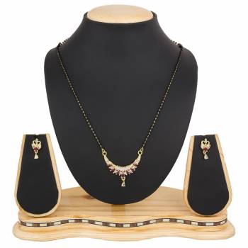 Instead Of Those Heavy Necklace, Carry This Beautiful And Elegant Looking Mamgalsutra Set At The Next Party You Attend. It Is Beautified With Diamond Work And You Can Pair This Up With Any Colored Attire.