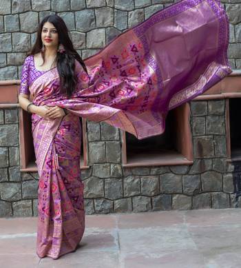 Add This Beautiful And Attractive Saree To Your Wardrobe In Purple Color Paired With Purple Colored Blouse. This Saree And Blouse Are Silk based Beautified With Weave All Over It. Its Pretty Shade Will Make You Look More Pretty.