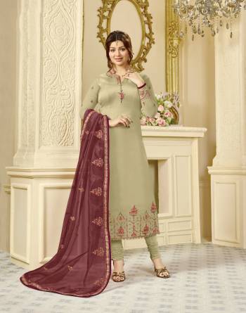 Lovely Color Pallete Is Here With This Designer Straight Suit In Cream Colored Top And Bottom Paired With Maroon Colored Dupatta. Its Top Is Fabricated On Georgette Satin Paired With Santoon Bottom And Orgenza Silk Dupatta. 