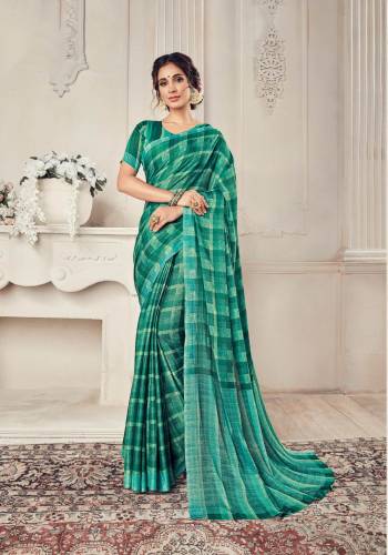 For Your Semi-Casual Wear, Grab This Beautiful Green Colored Saree Paired With Green Colored Blouse. This Saree And Blouse Are Georgette Based Beautified With Checks Prints All Over The Saree. Buy Now.