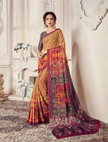 Look Attractive Wearing This Saree In Yellow And Multi Color Paired With Navy Blue Colored Blouse. This Saree And Blouse Are Georgette Based Beautified With Prints All Over It.