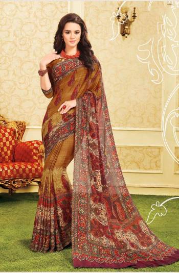 Look Attractive Wearing This Saree In Brown And Multi Color Paired With Brown Colored Blouse. This Saree And Blouse Are Georgette Based Beautified With Prints All Over It.