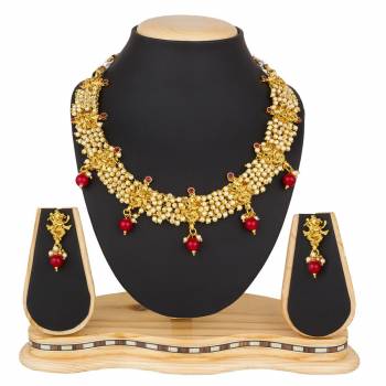 Give A Rich And Elegant Look To Your Neckline Wearing This Elegant Looking Necklace Set In Golden Color. This Necklace Set Be Paired With Any Colored Ethnic Attire. Buy Now.