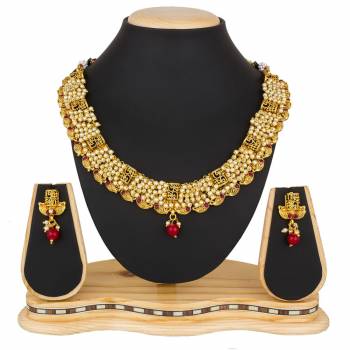 Give A Rich And Elegant Look To Your Neckline Wearing This Elegant Looking Necklace Set In Golden Color. This Necklace Set Be Paired With Any Colored Ethnic Attire. Buy Now.