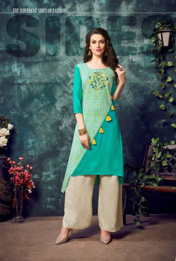 Here Is A Designer Readymade Kurti In Sea Green Color Fabricated On Rayon. This Pretty Kurti Has Asymetric Pattern Which Will Earn You Lots Of Compliments From Onlookers. 